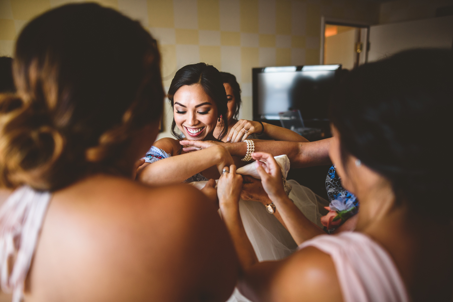 004 filipino bride getting into wedding dress.jpg