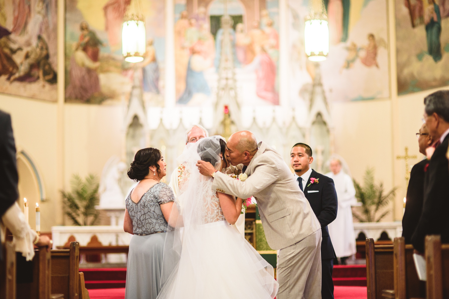 013 father of the bride kissed the bride on the cheek.jpg
