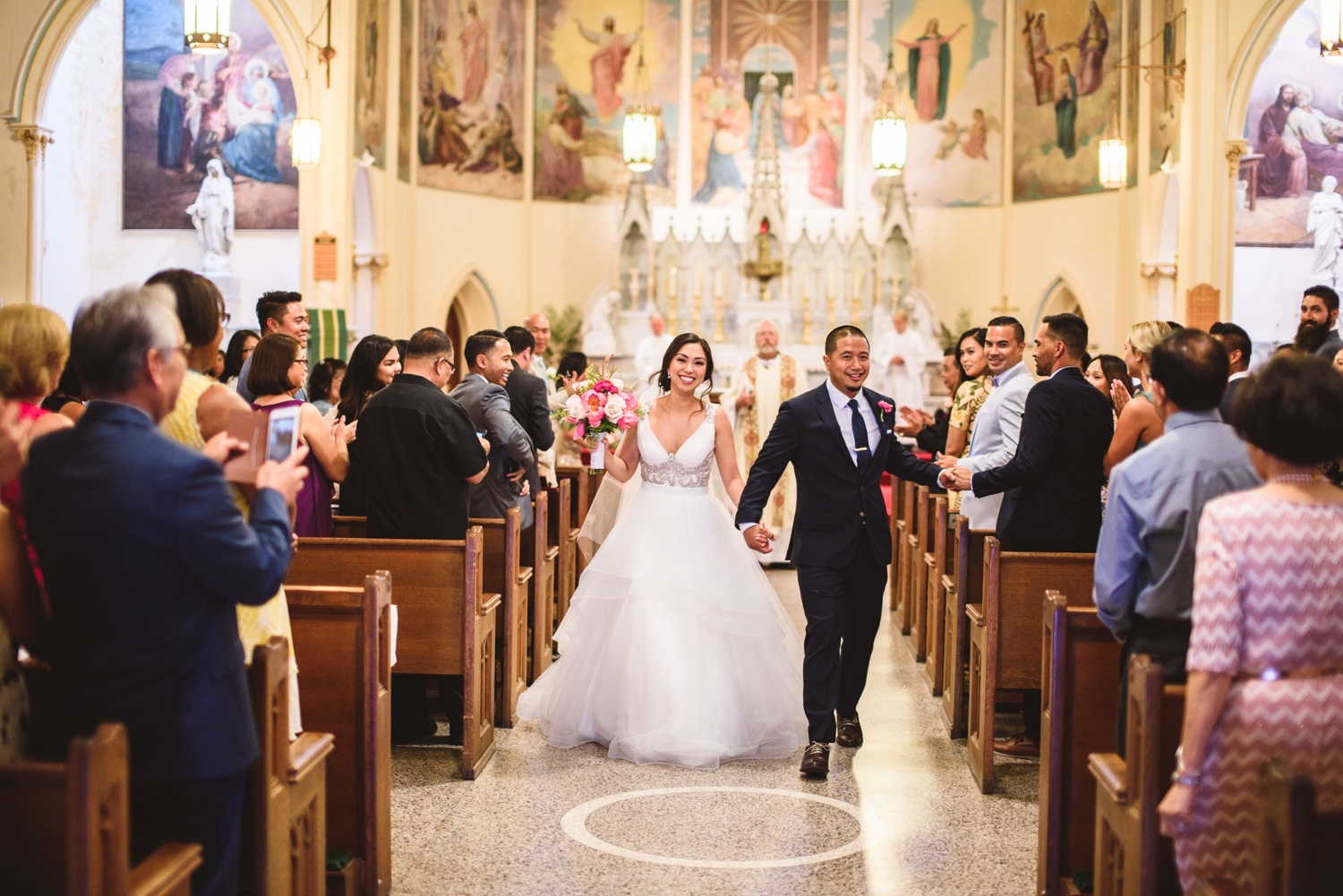 017 bride and groom walking down the aisle.jpg