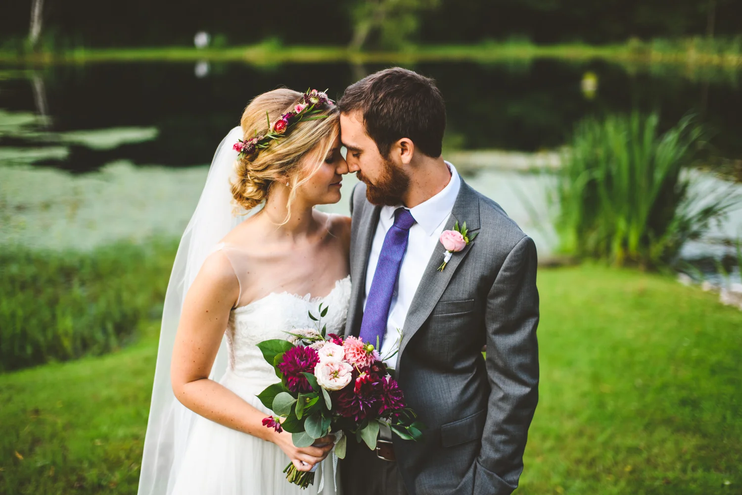 016 - bride and groom portrait in front of a lake.jpg
