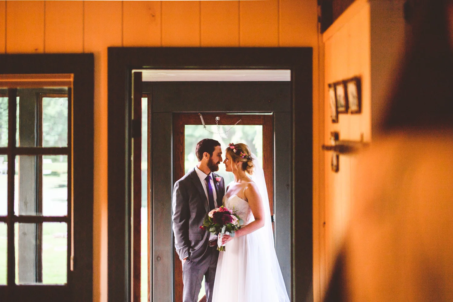 018 - portrait of bride and groom inside the bridal cottage.jpg