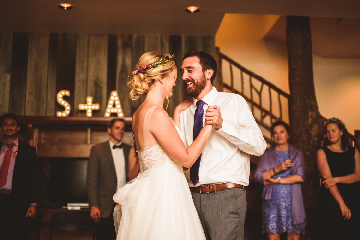 024 - bride and groom first dance with the first letter of their first names in lights.jpg