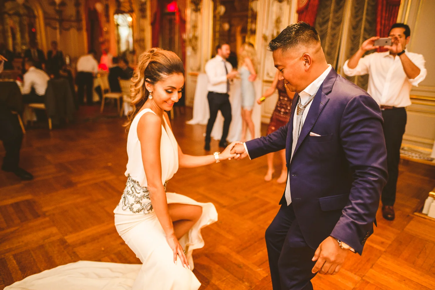 017 bride to be and groom to be share a dance at their engagement party in washington dc.jpg