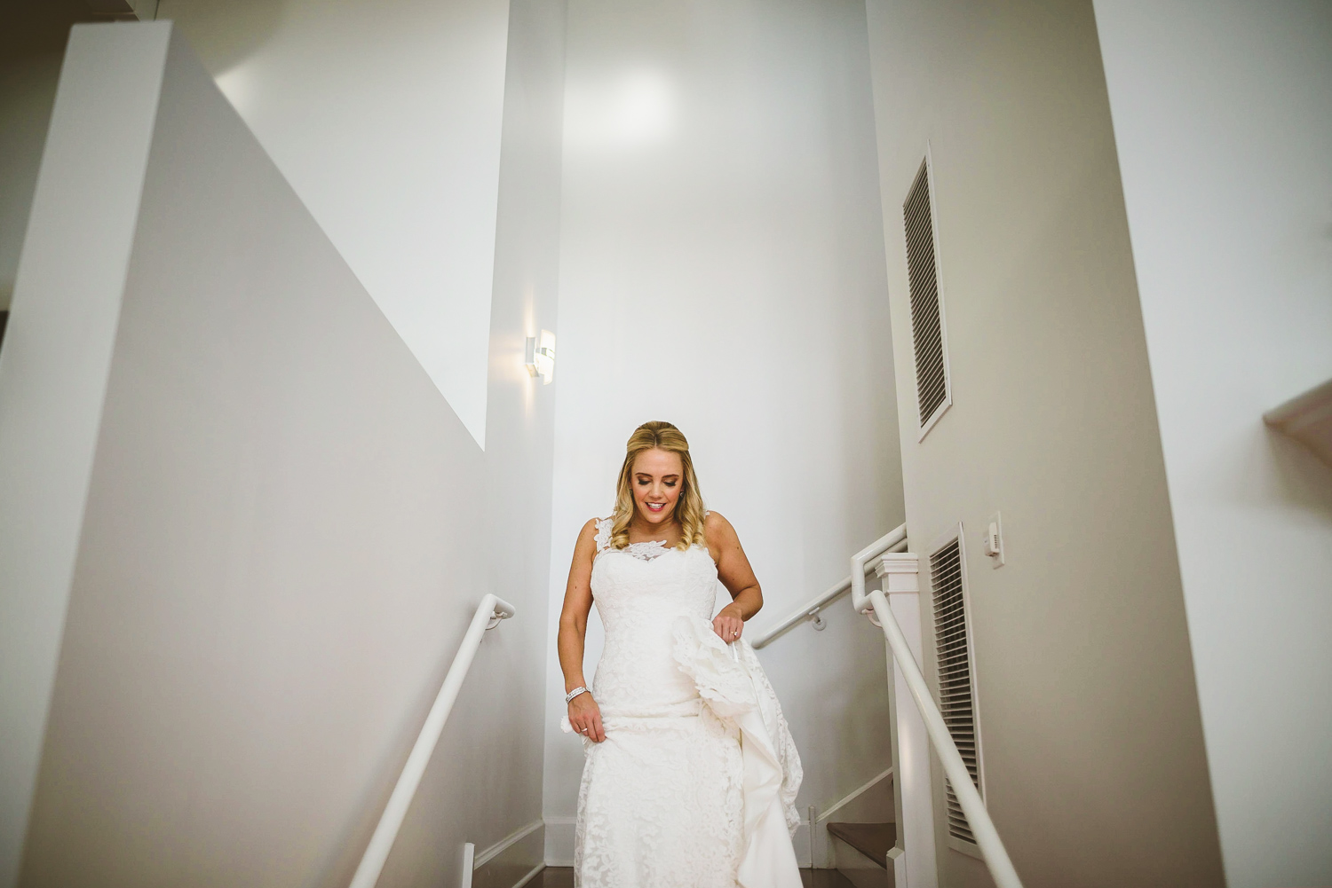 002 - bride walking down stairs at upper shirley vineyards.jpg