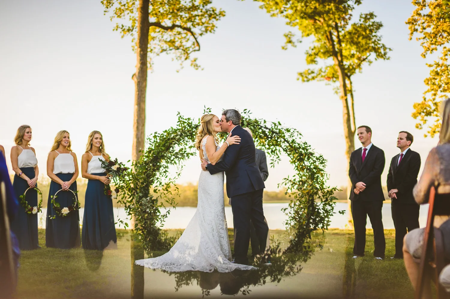 010 - beautiful first kiss next to the james river at a virginia vineyard.jpg