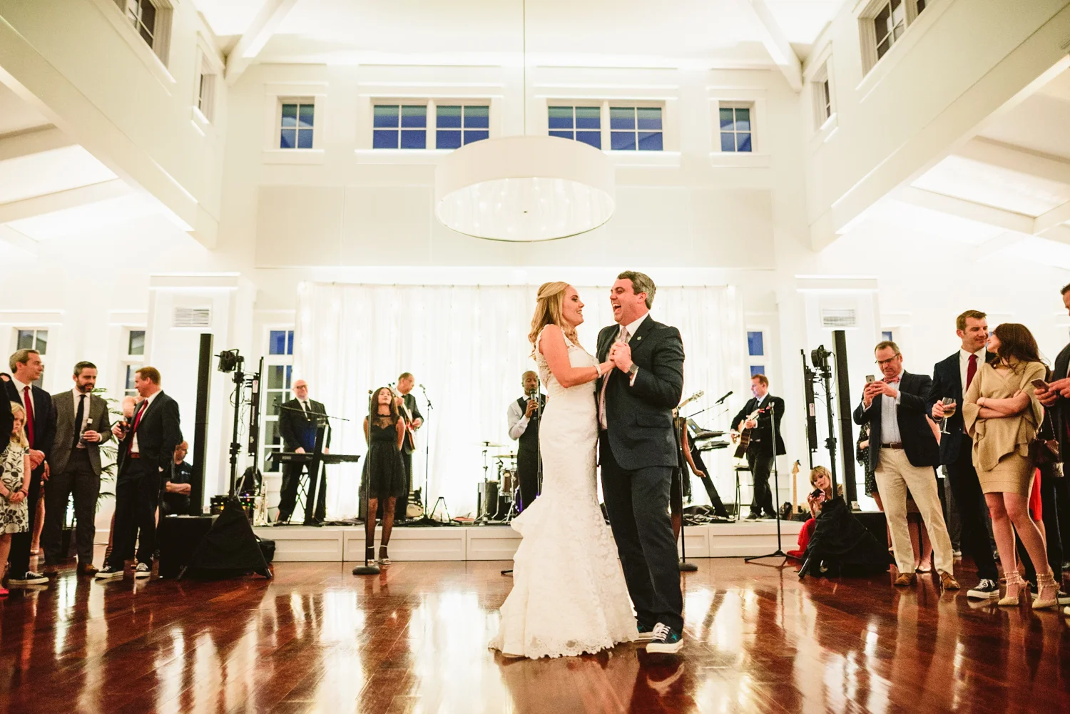 013 - groom laughs during the first dance at the wedding reception.jpg