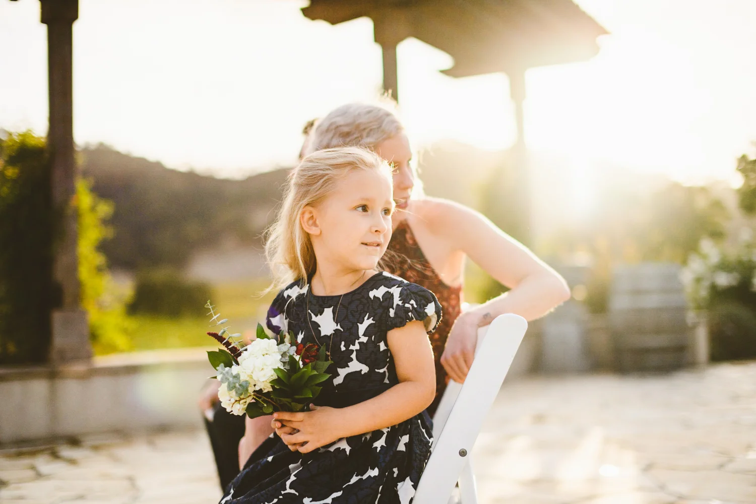 014 - daughter of the bride watches as bride walks down the aisle.jpg