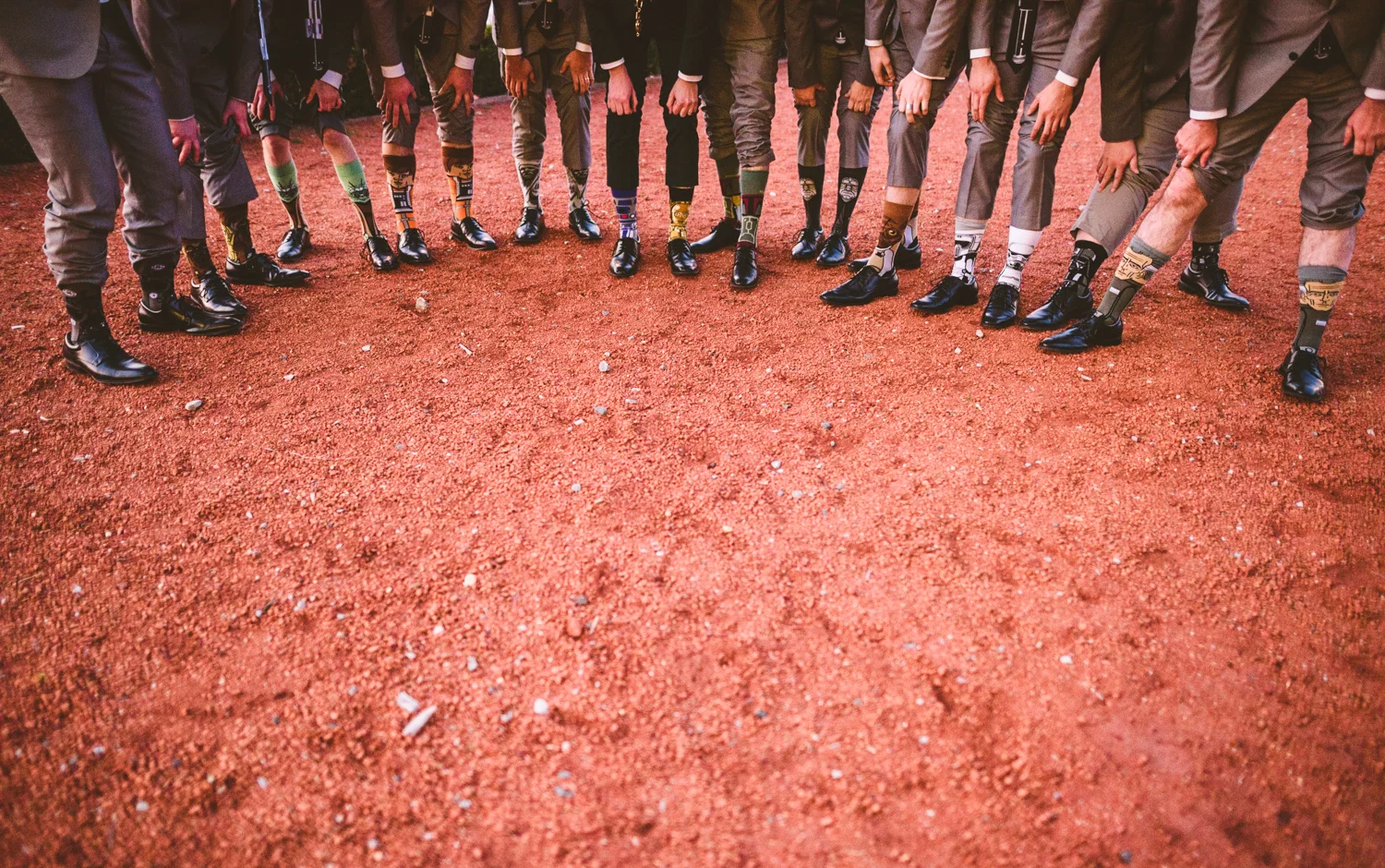 025 - groomsmen showing off their star wars socks.jpg