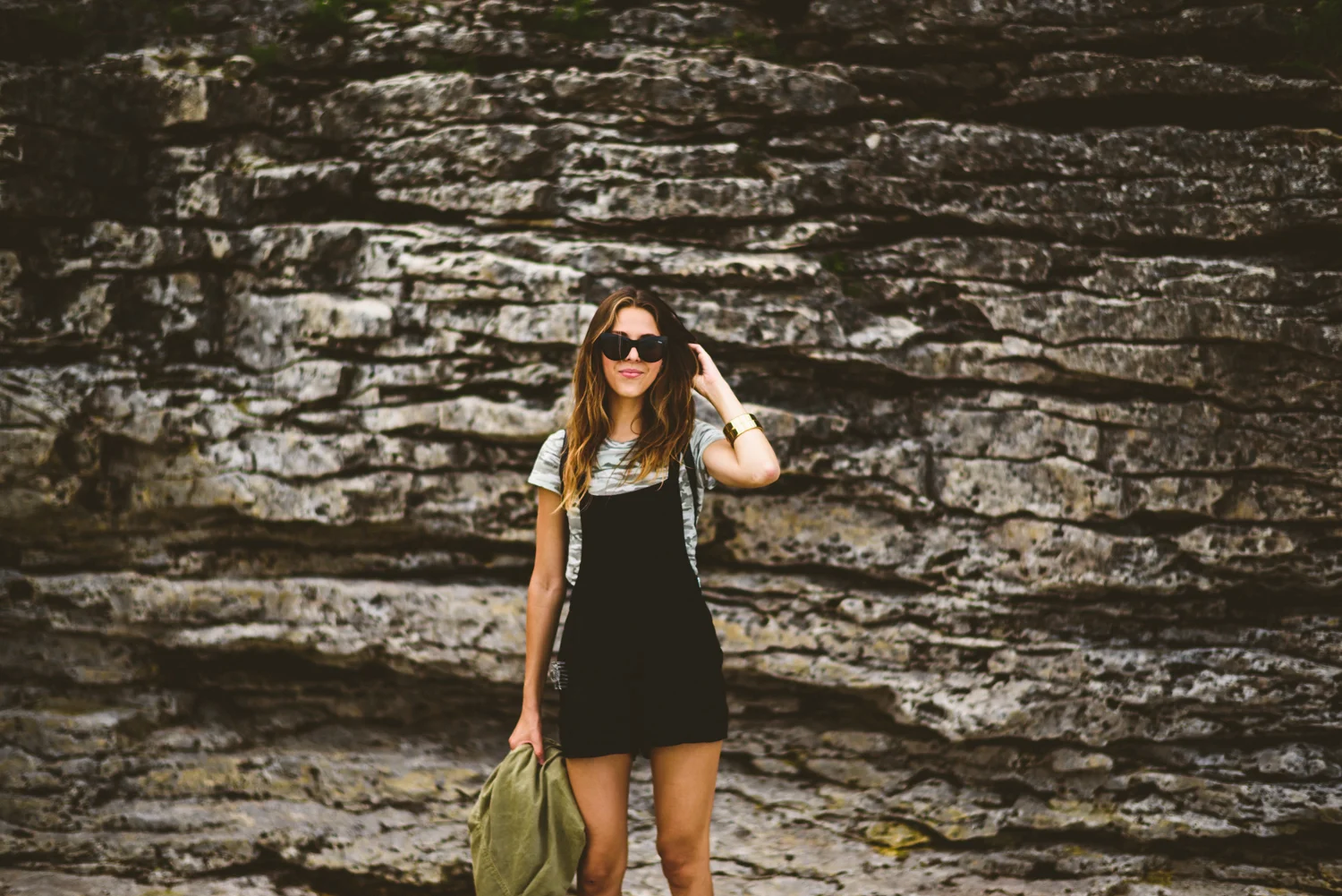 046 - sunglasses girl in front of rocks.jpg