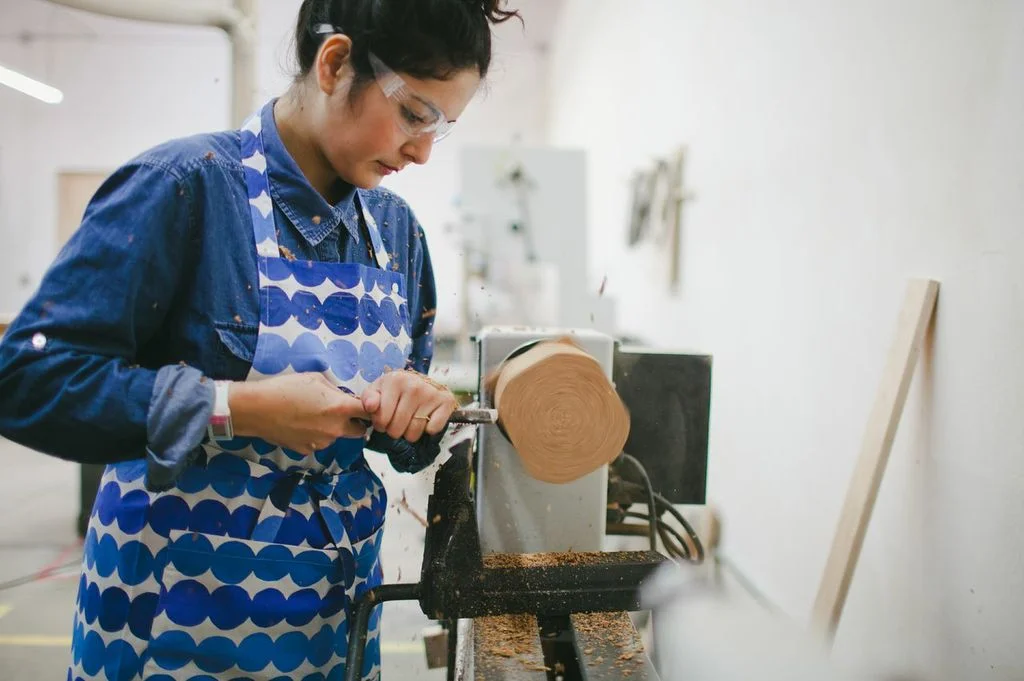 Lathing the piece of cork into a vase