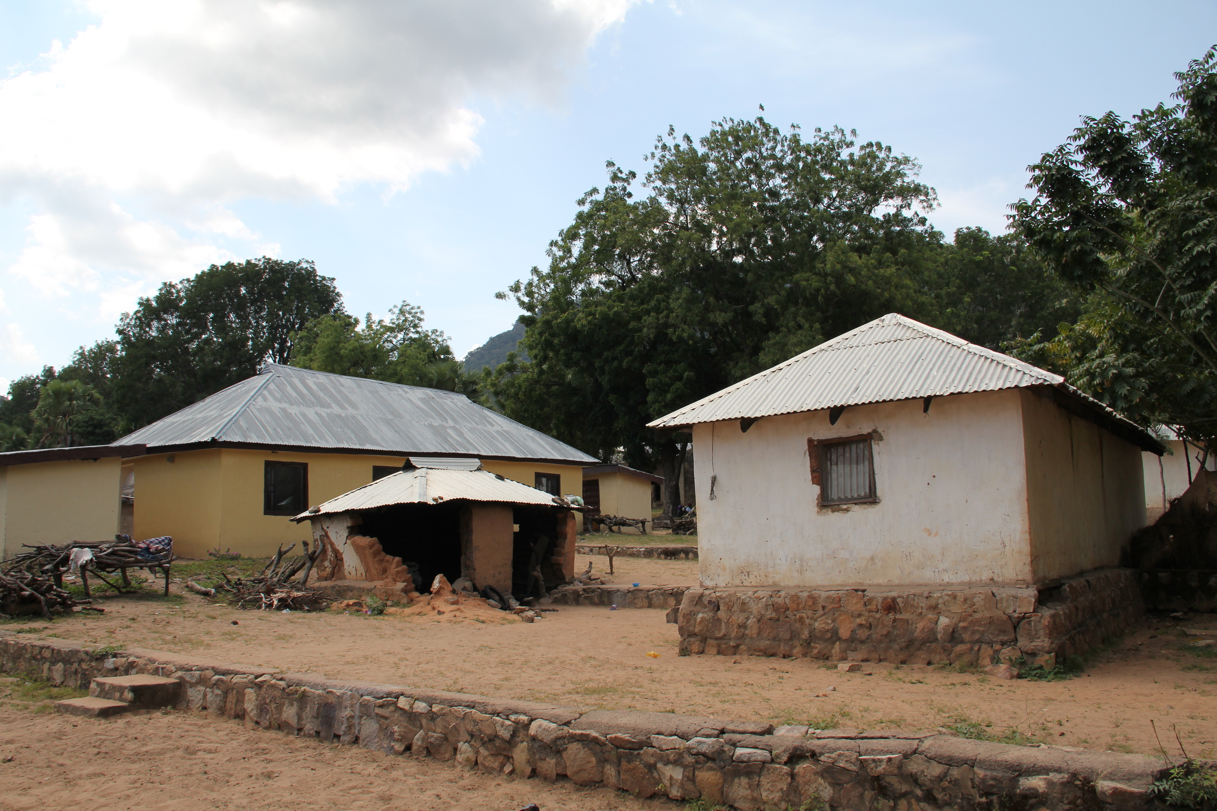  Duplexes in the married student neighborhood with a collapsing kitchen hut between the houses. 