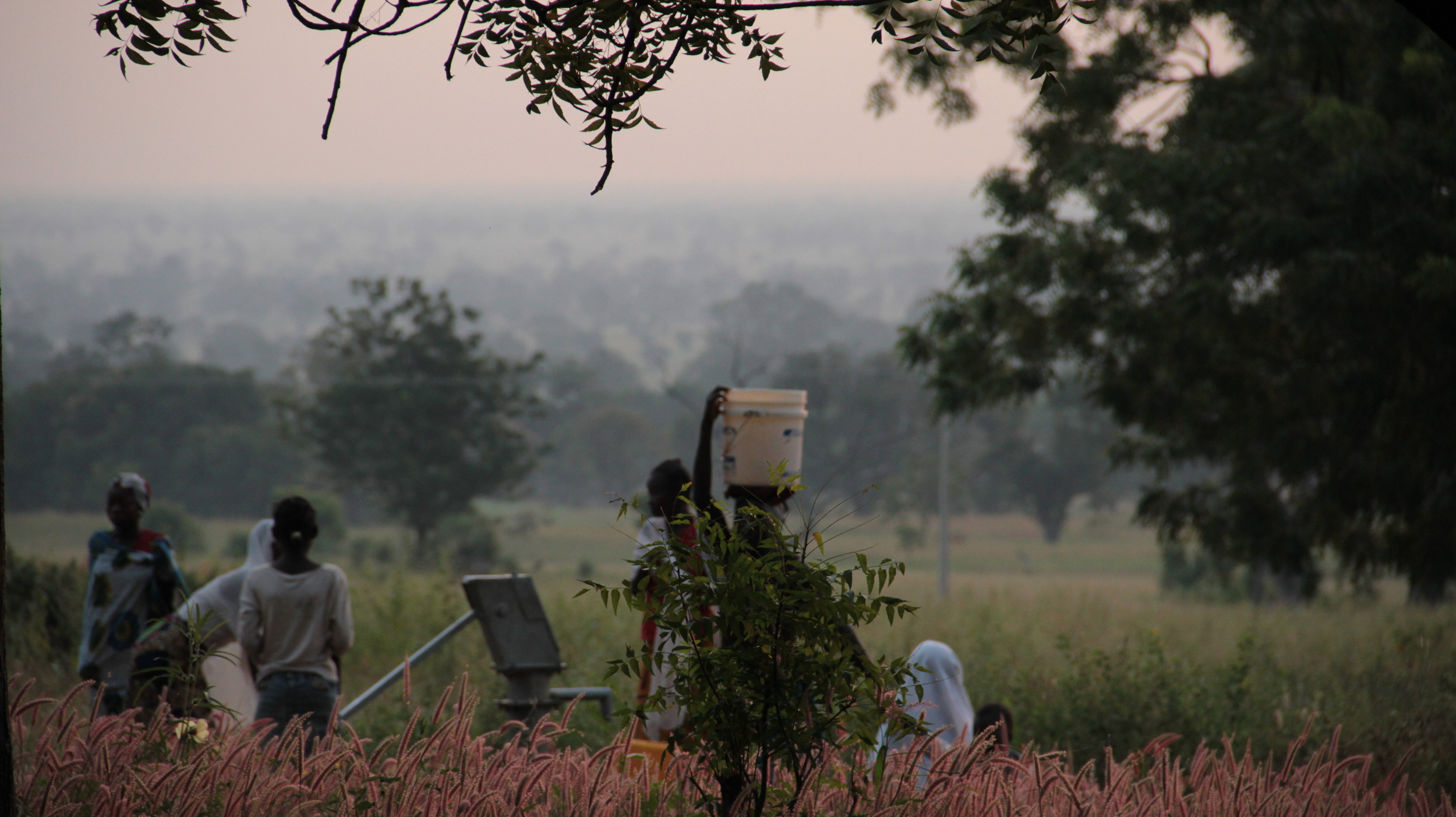  Gathering at the well at sunrise. 