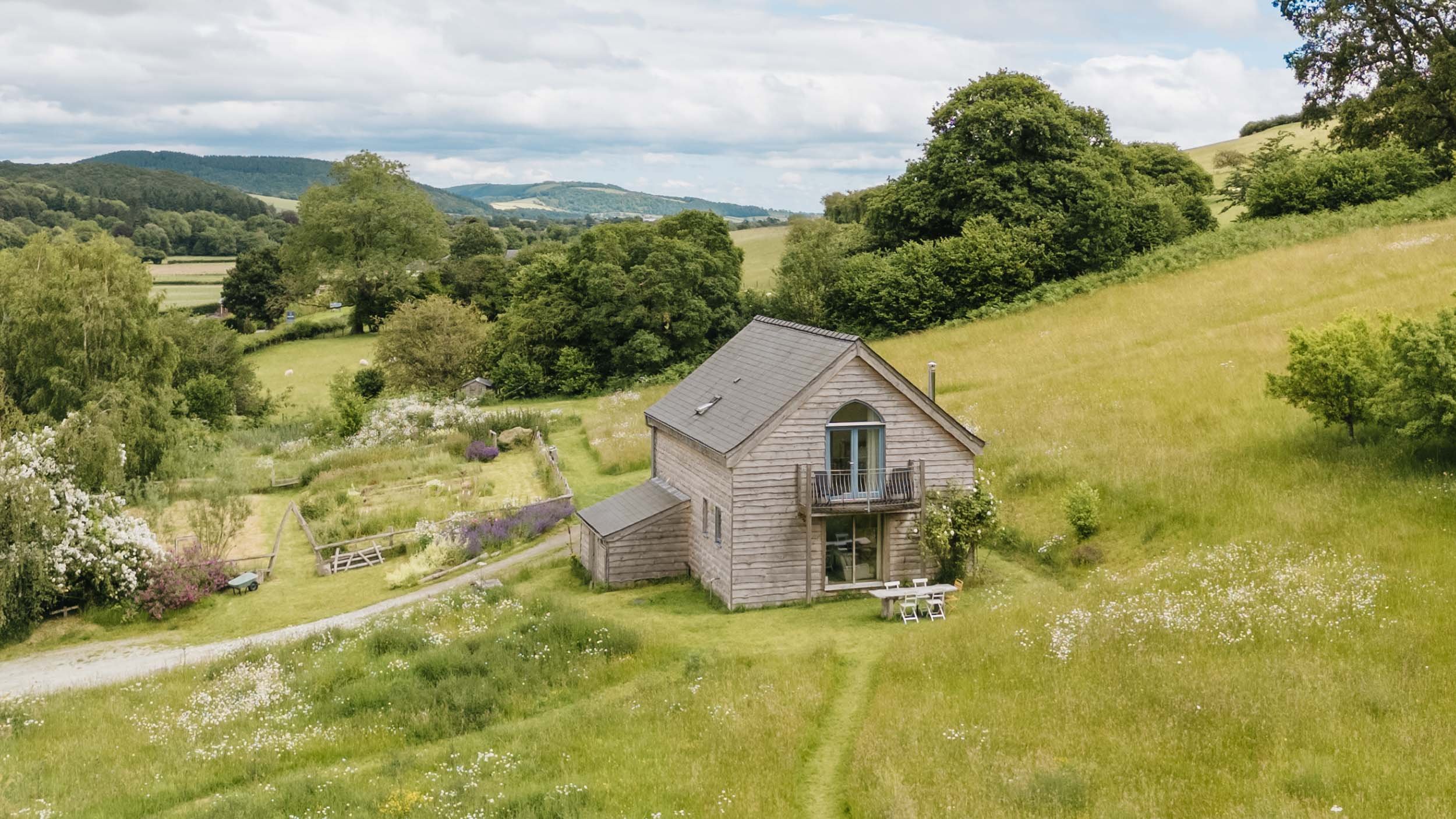 wooden cottage in fields - self catering accommodation