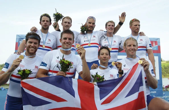 The whole crew celebrating our medals - Tom and Moe kindly holding me up!