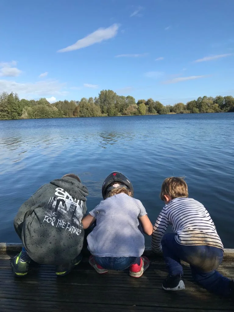 Jasper, Daisy & Jesse peering into the cool clear depths.