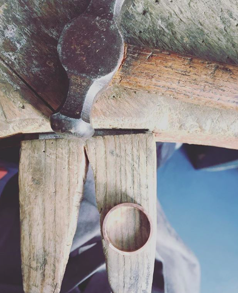 ring with hammer on jewellery bench peg 