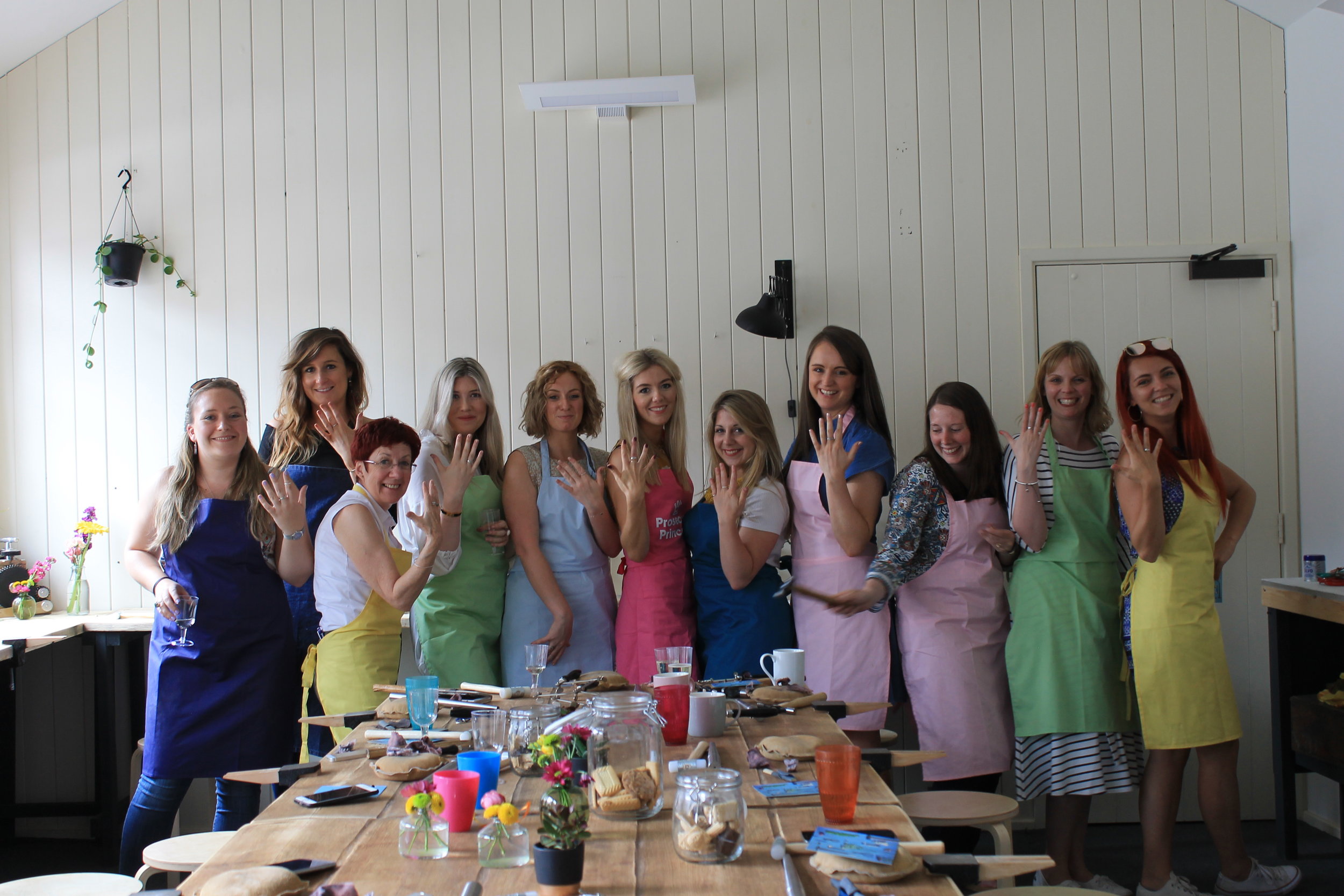 a group of girls on a jewellery making hen party 