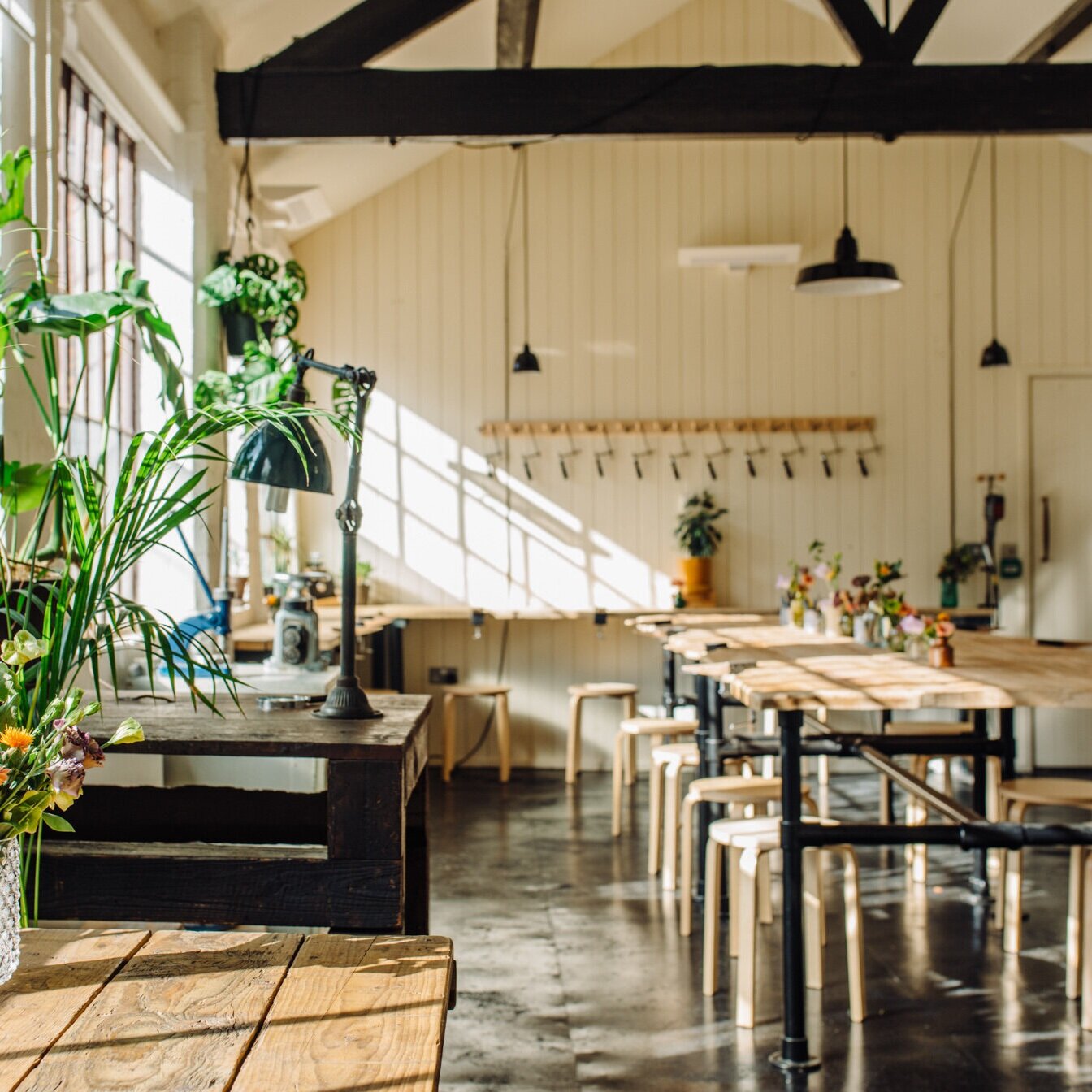 Jewellery Class studio space with plants, benches and tools 