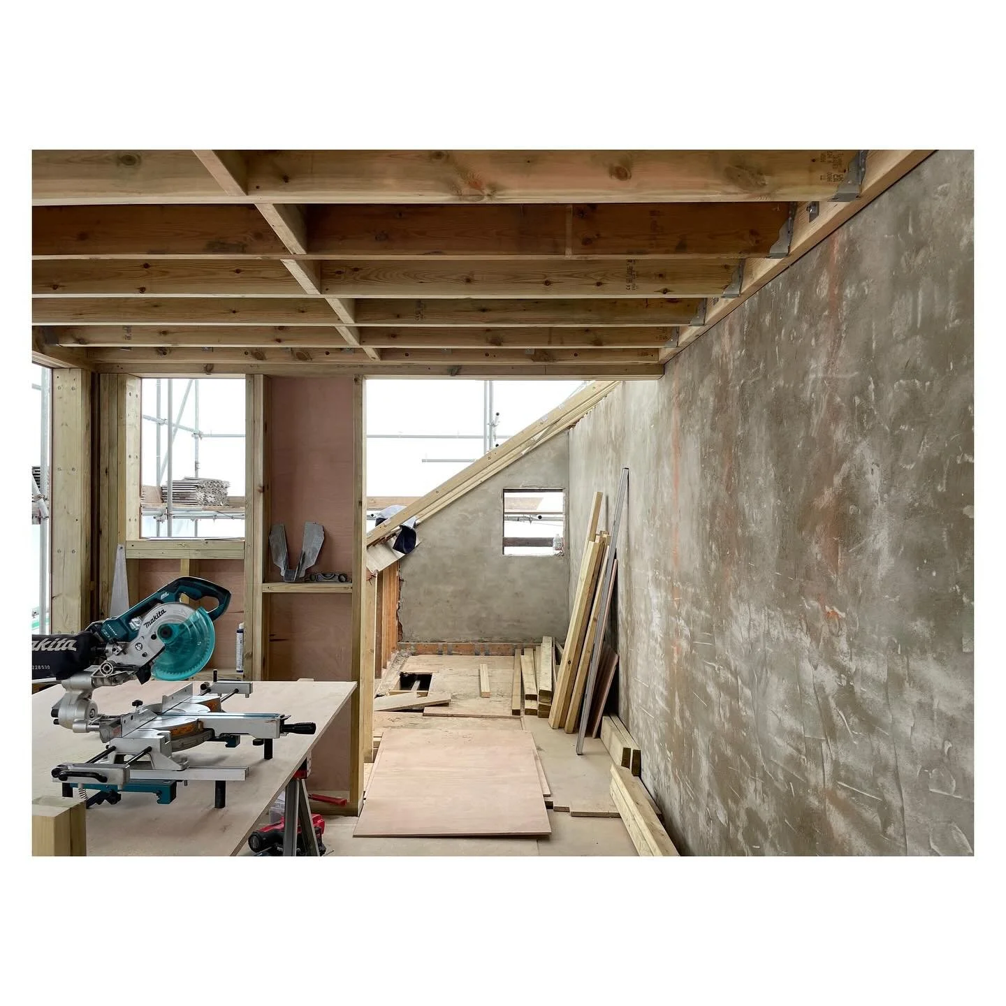 | Bath Retrofit

A slightly ethereal feel on site this week, below the scaffolding and bright sky.

The pitched roofs have been cut back and the new dormer construction is underway. The existing party wall has been parge coated as part of the air tig