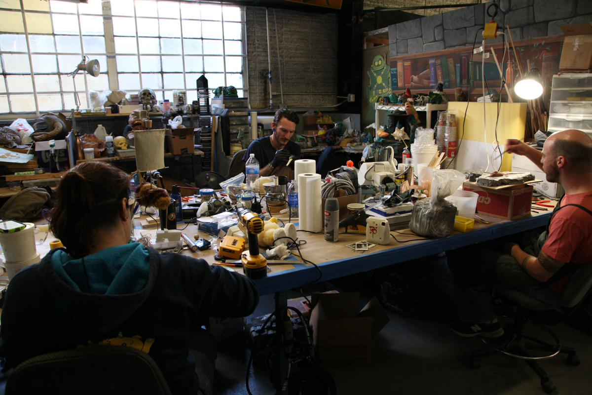   The puppet fabrication team, hard at work.  