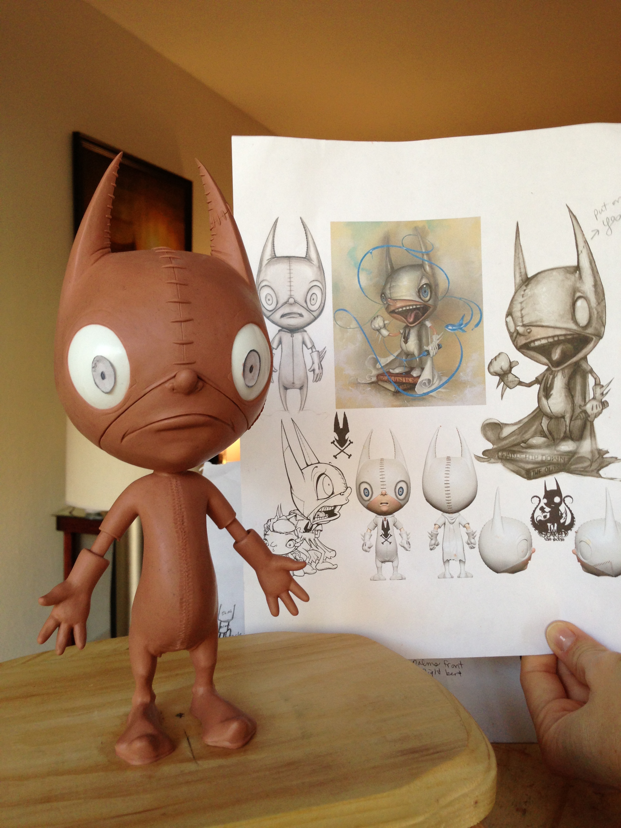   Ralf's sculpt compared to sketches and the vinyl toy design.  