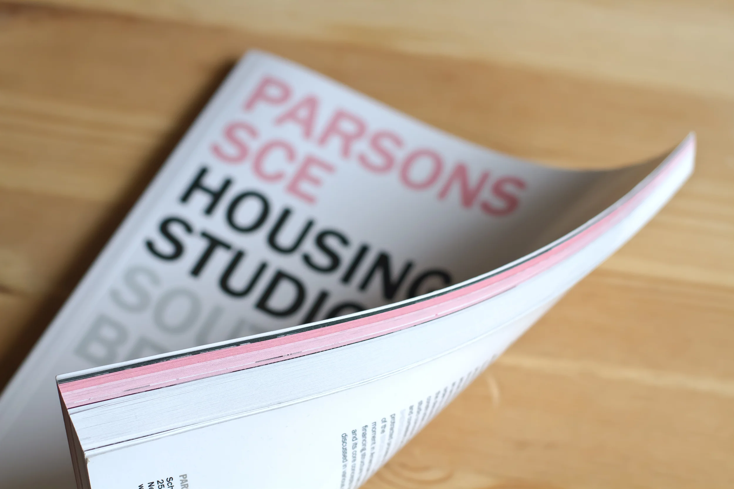 Research pages are identified by a pink edge while student projects are identified with a white edge