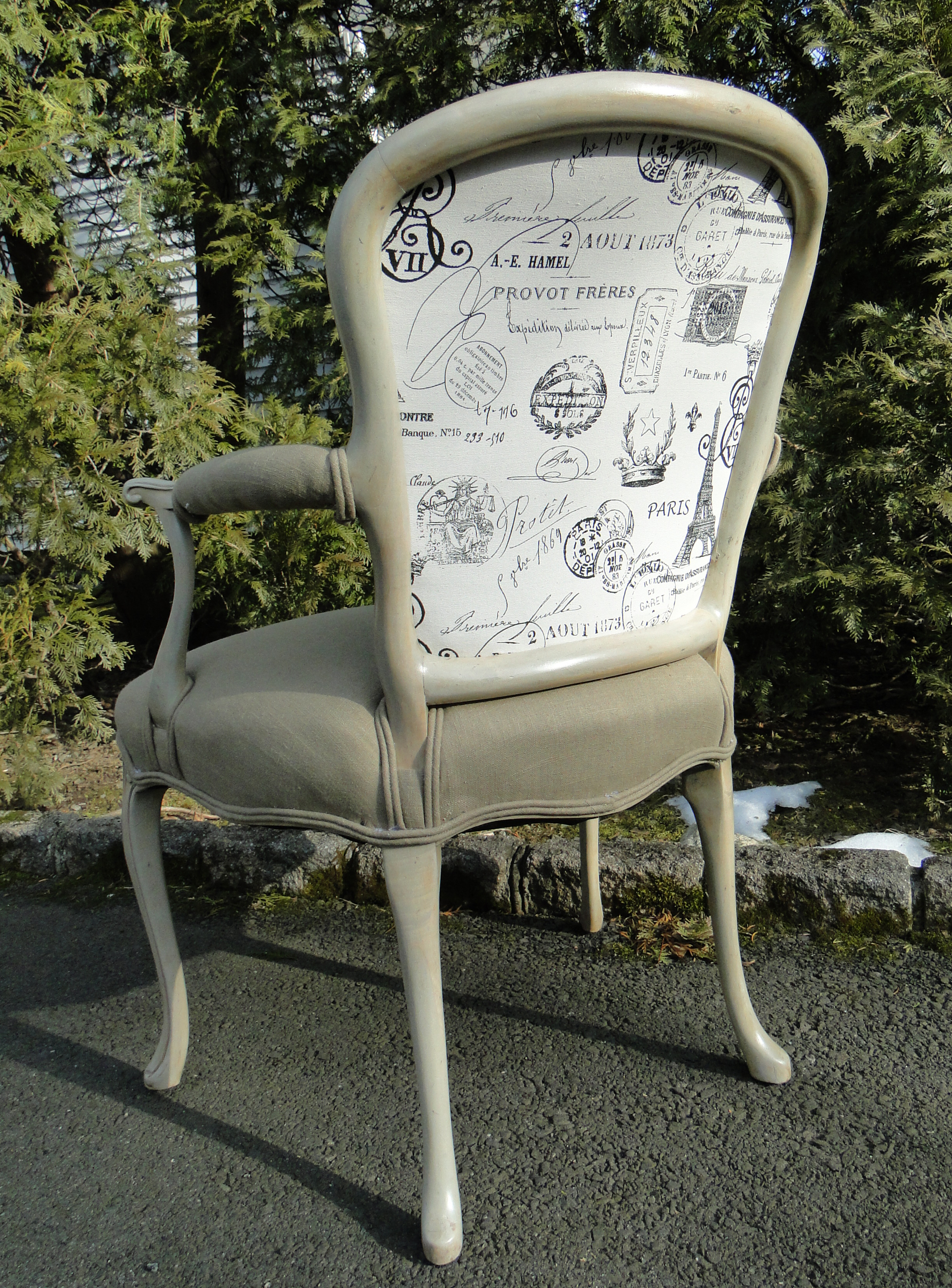 Back of chair in Paris-themed fabric