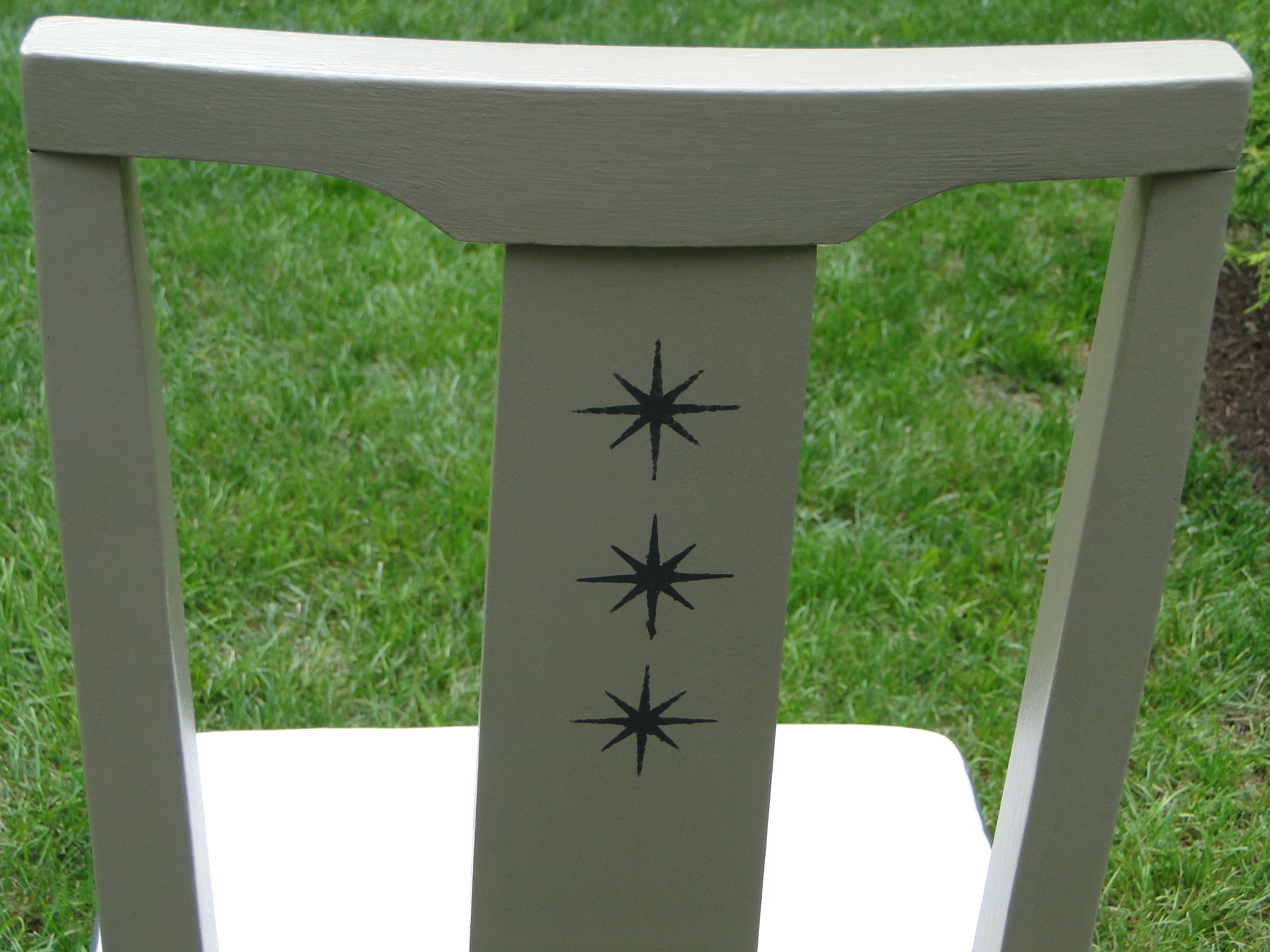 Stenciled "stars" on back of chair