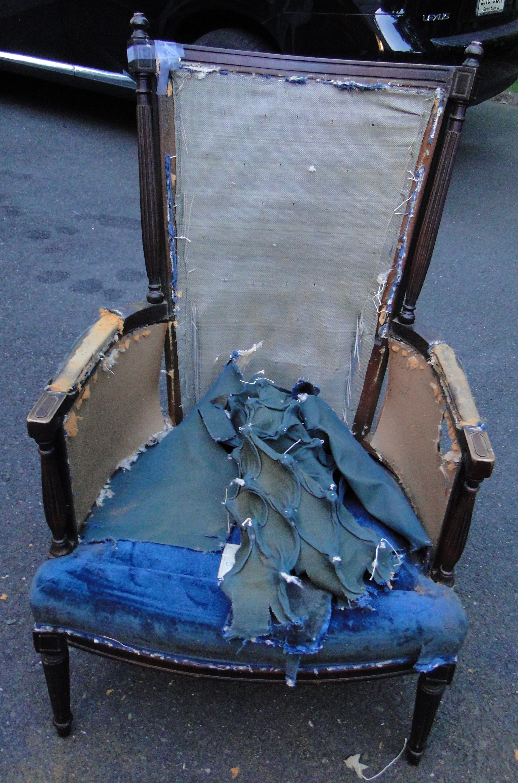 "Before" photo of partially stripped chair