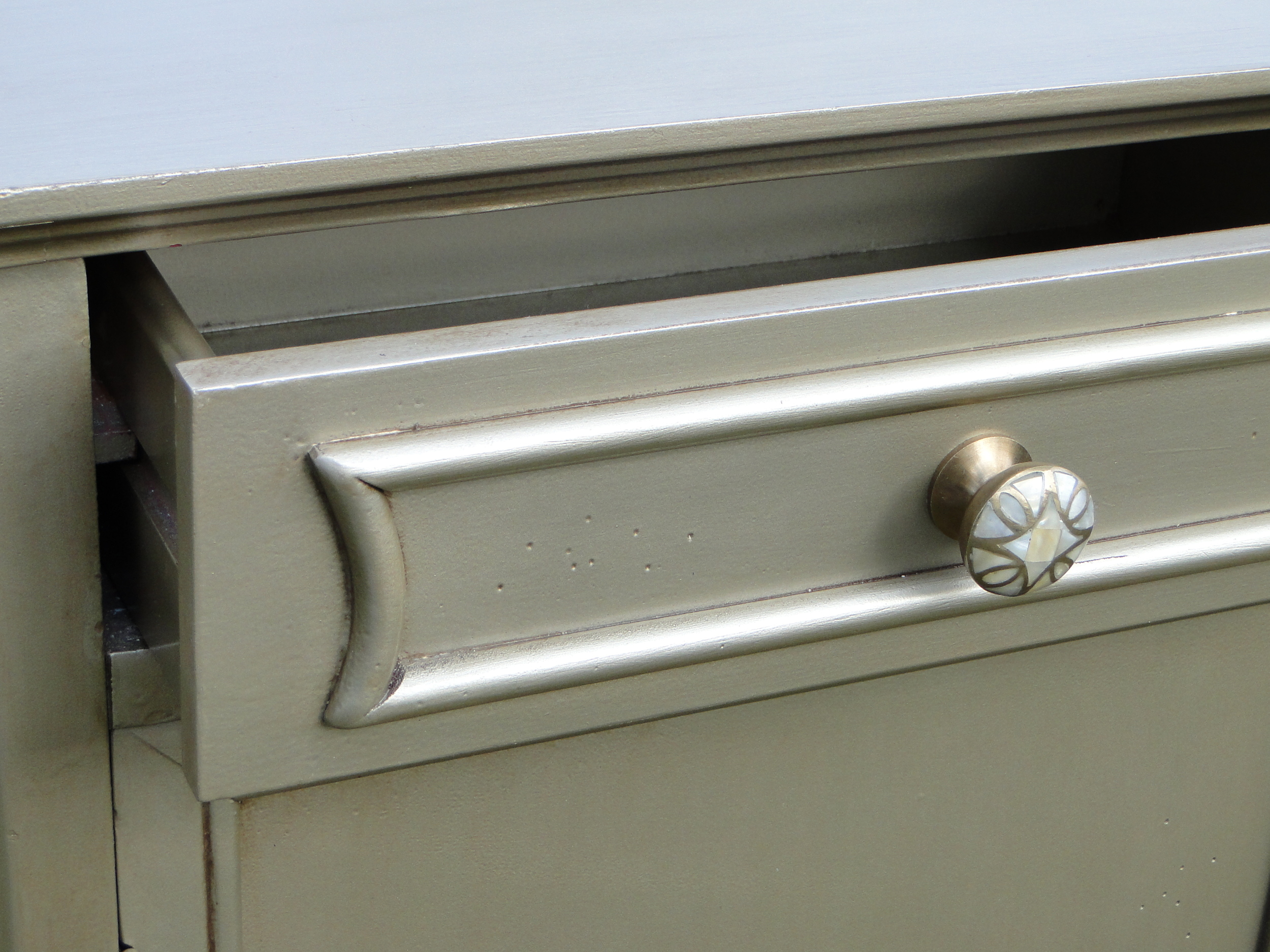 Close up of drawer with new finish & knobs