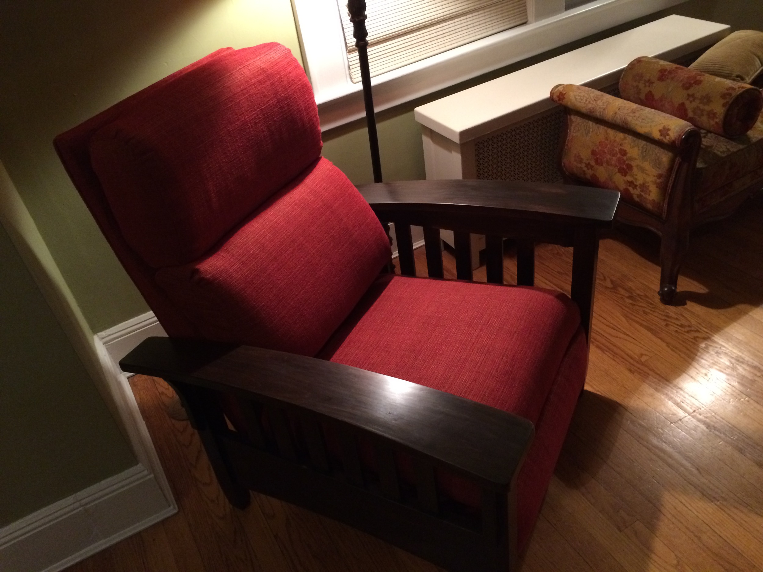 "After" Revamped chair with new fabric and wood finish