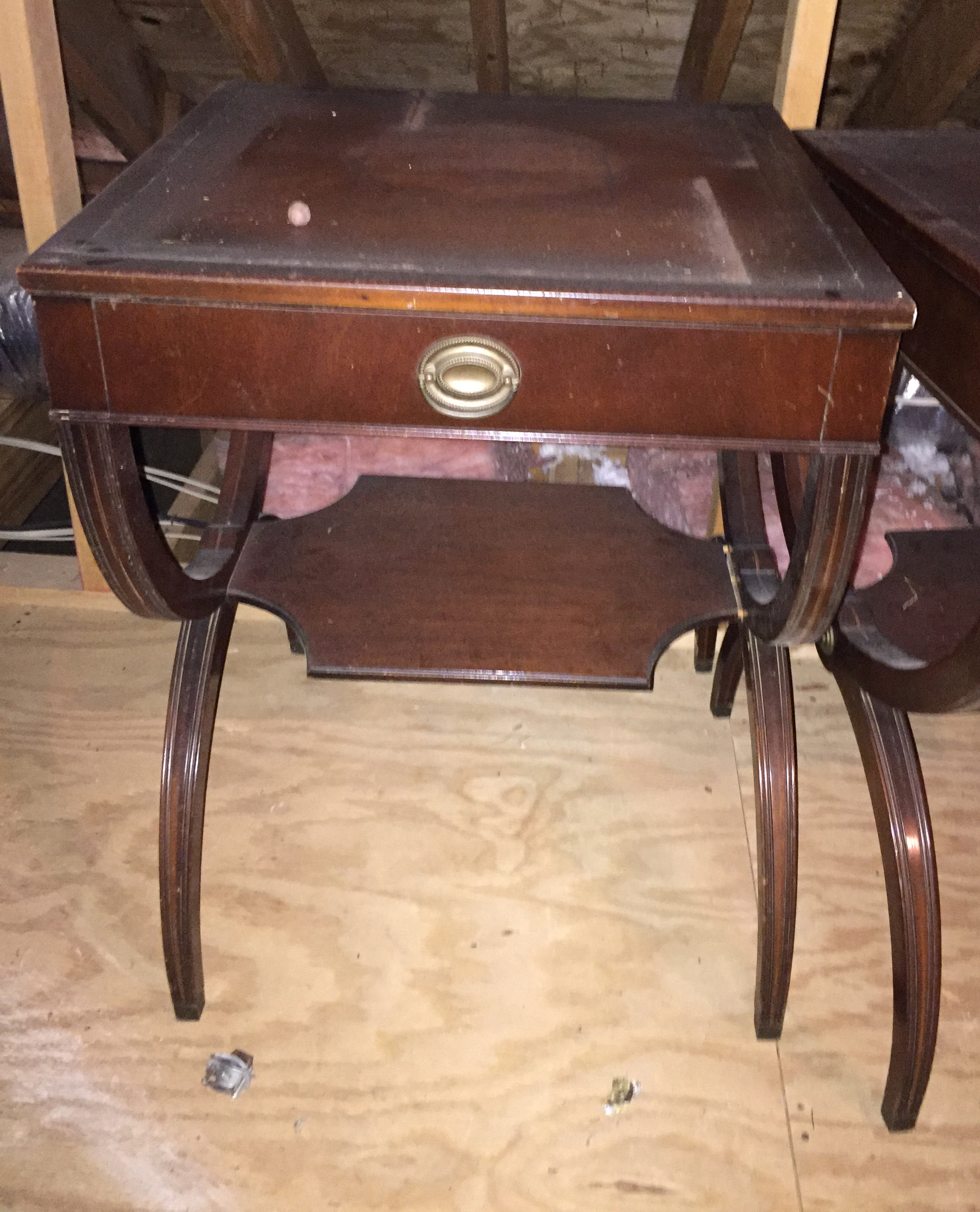 "Before" view of dusty table waiting in attic