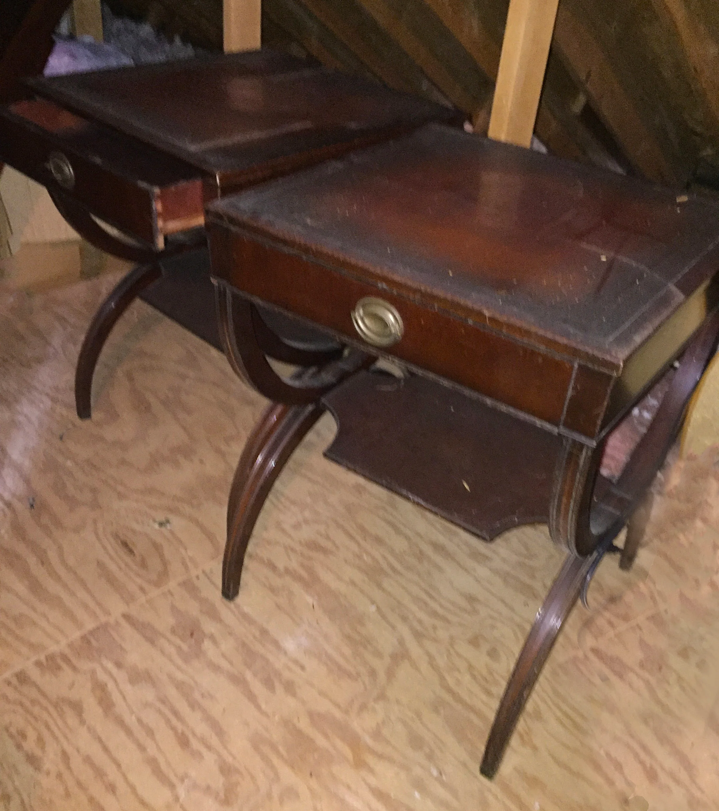 "Before" view of dusty side tables in customer's attic