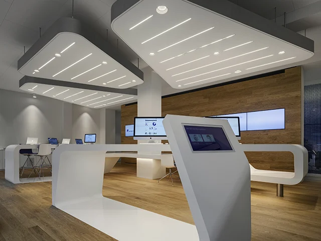 A Zigzag Logo Turns Interactive Desk at Zurich's New VZ Finanzportal