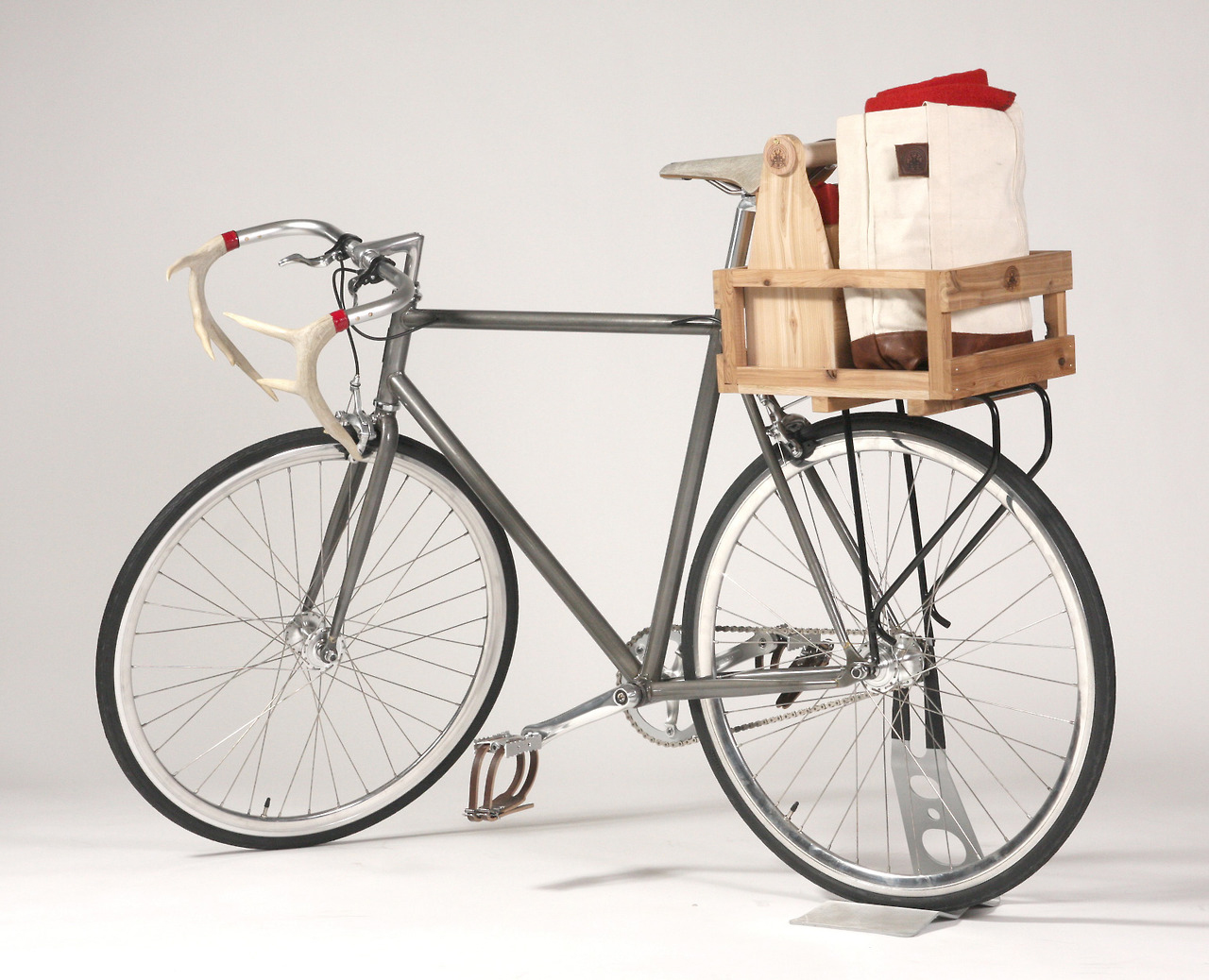 Lumburr Co Bicycle with six-pack holder, crate and antler handlebars