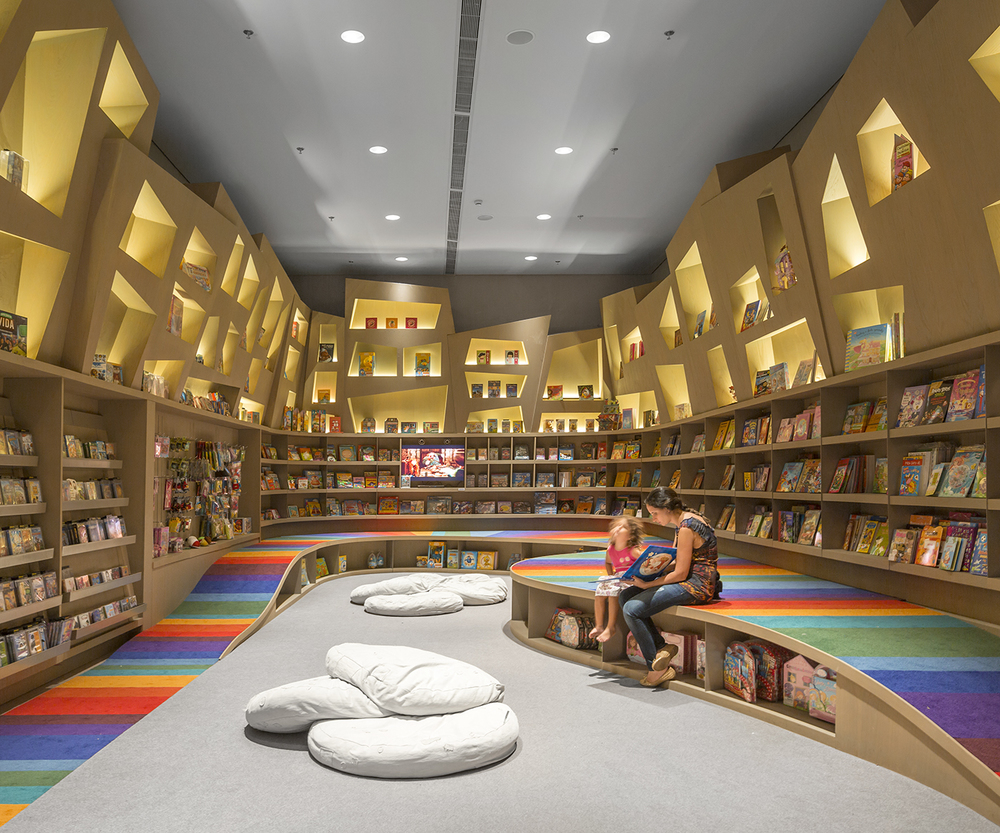  Arthur Casas Designs A Rainbow Twisted Kids Book Den for Saraiva 