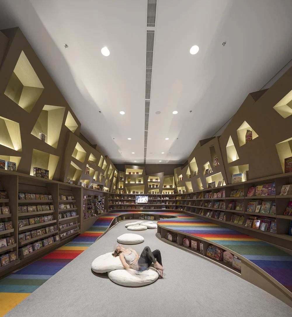  Arthur Casas Designs A Rainbow Twisted Kids Book Den for Saraiva 