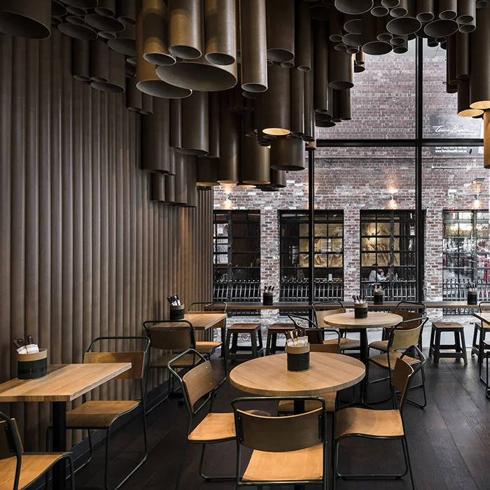 Techné Makes Creative Use of Cardboard Tubes at Grill’d's New Melbourne Eatery