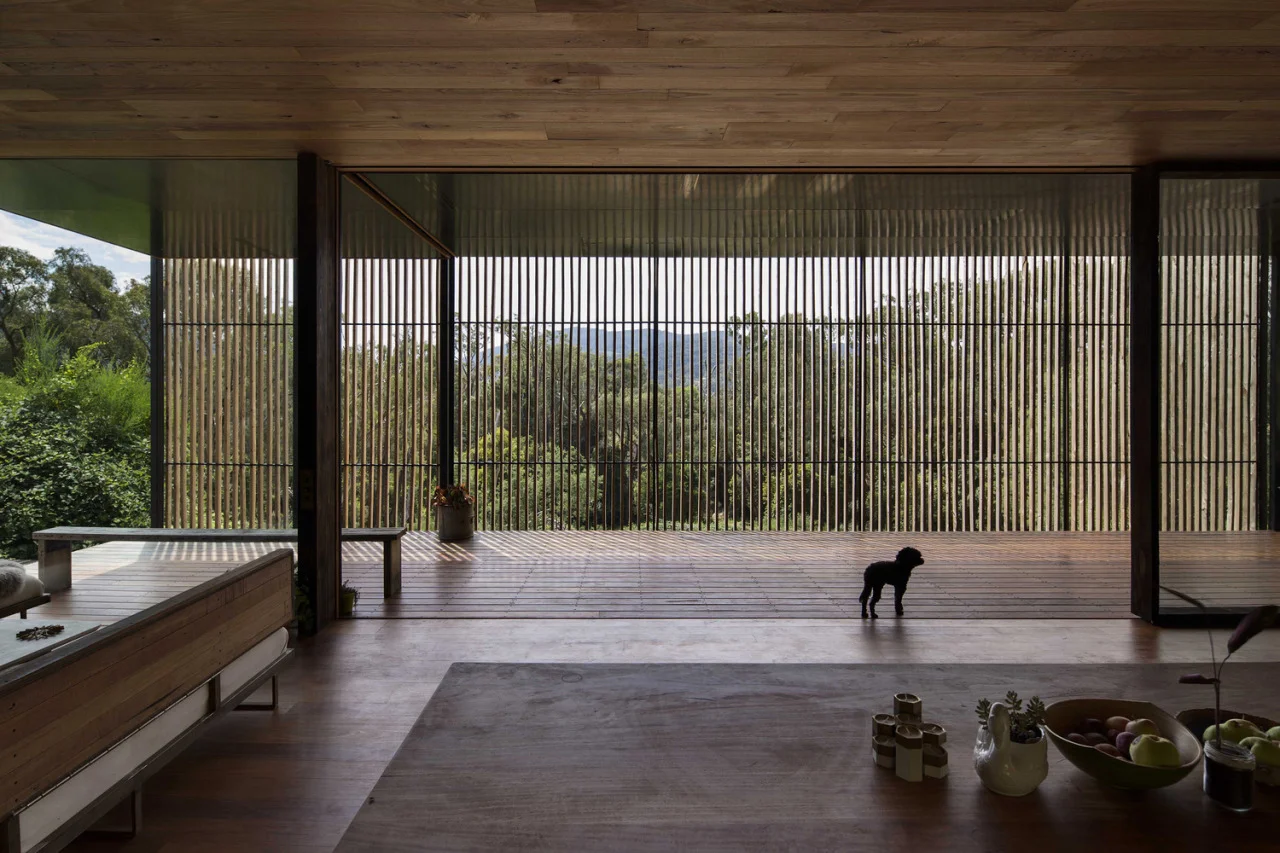 Archier Recycles 270 castaway concrete blocks to create modern cliffside home