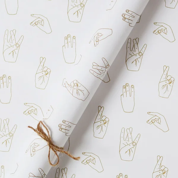 Five hands wrapping paper