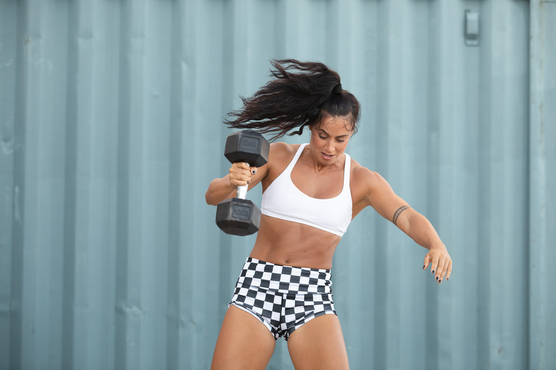 Gonçalo Barriga Sports Photographer - CrossFit athlete dumbbell snatch