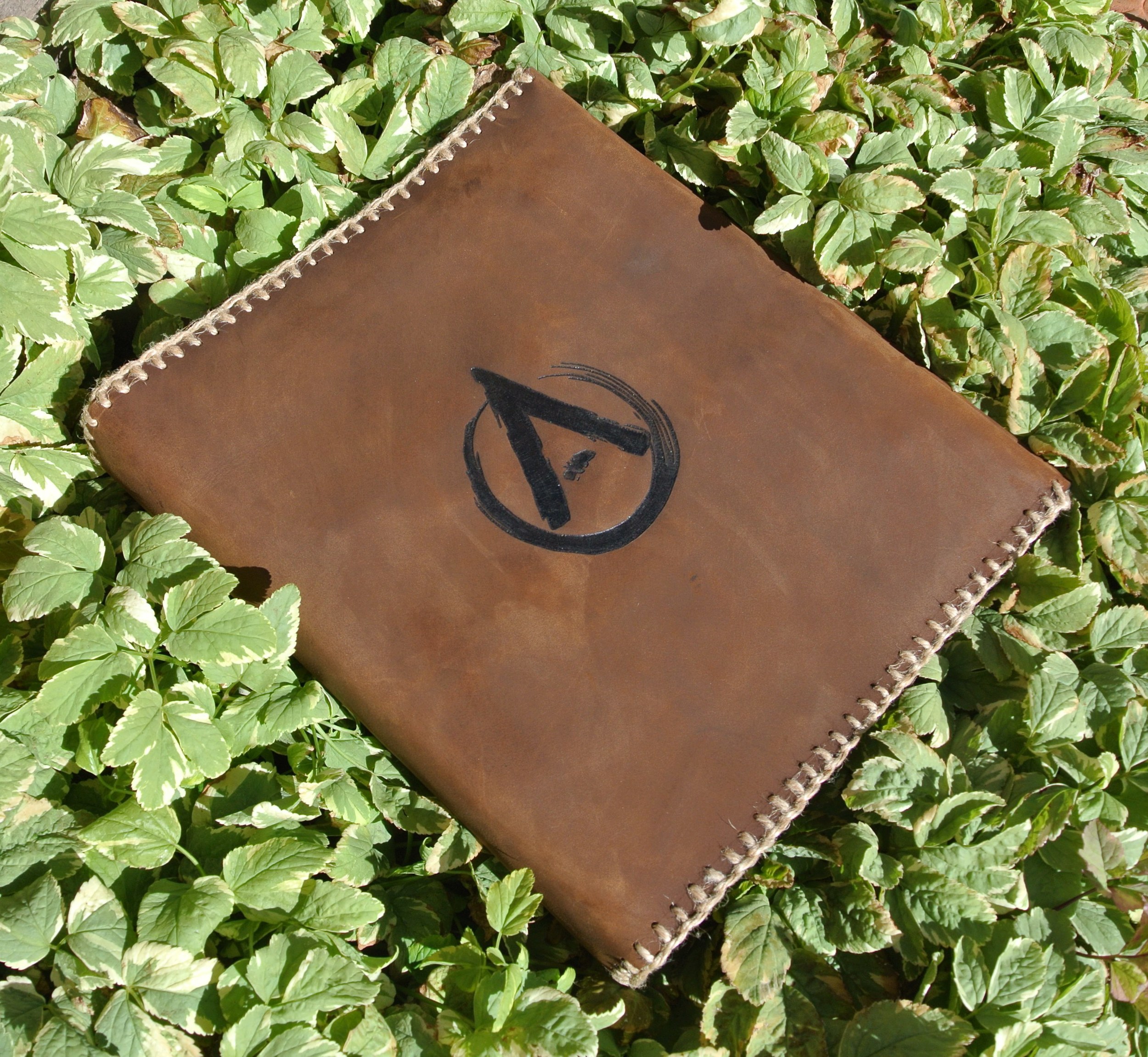 Circle M-Brand - custom leather binder cover.JPG