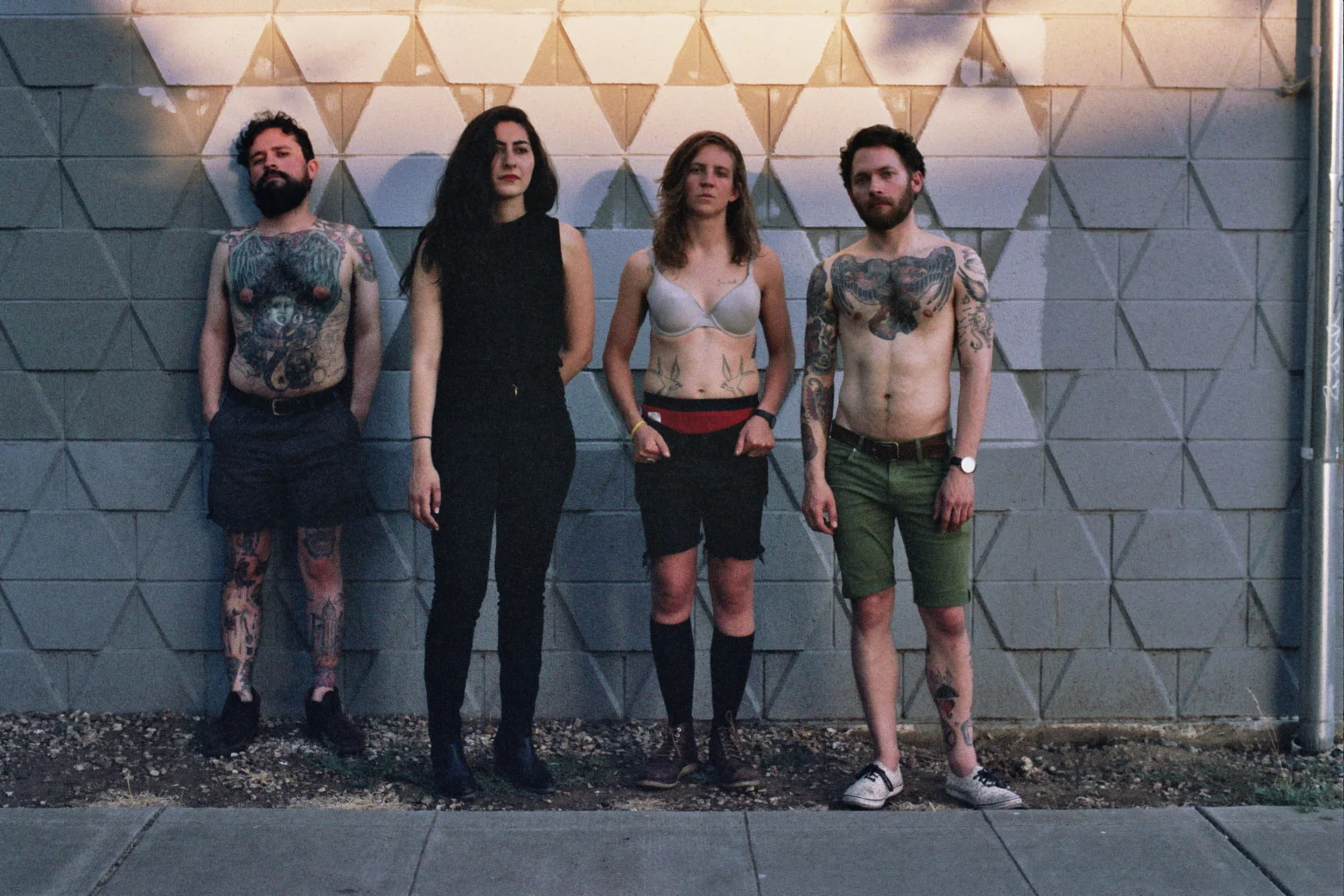 King Woman in Chico, CA outside Orange St Studio. Joey (percussion), Kristina (vocals), Sky (bass) and Colin (guitar).