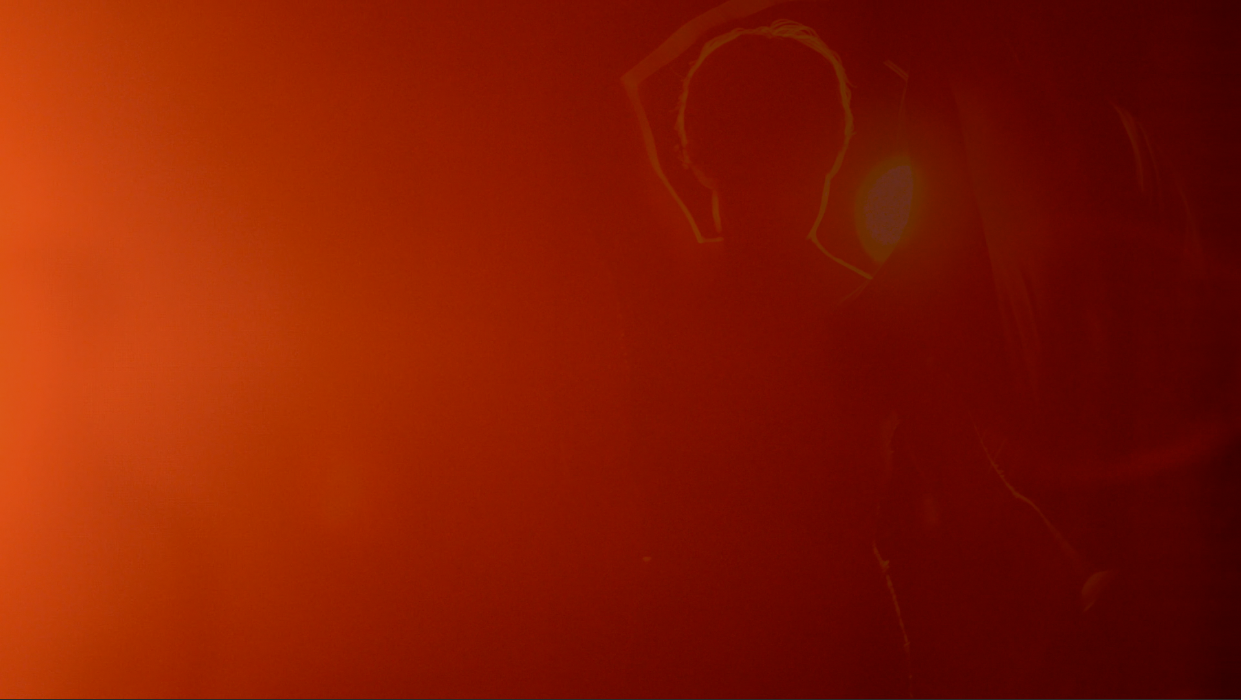 Into The Red is a short experimental, narrative film which was was completed in May of 2014. It tells the story of a woman who seeks to burn a possessed garment.