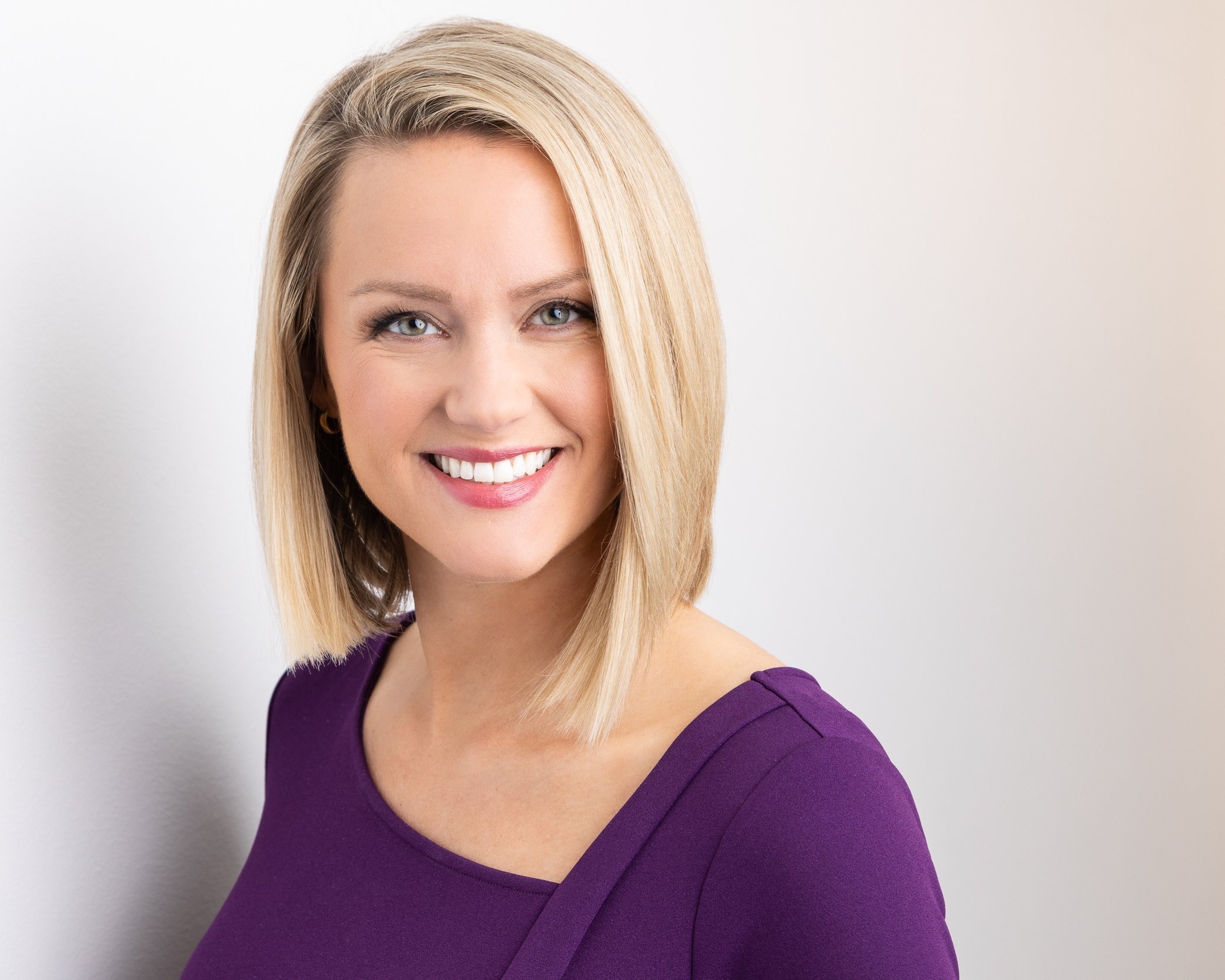 Modern professional blond female headshot 