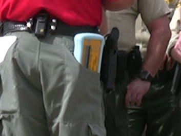 Control unit in officer's pocket-- resized.jpg