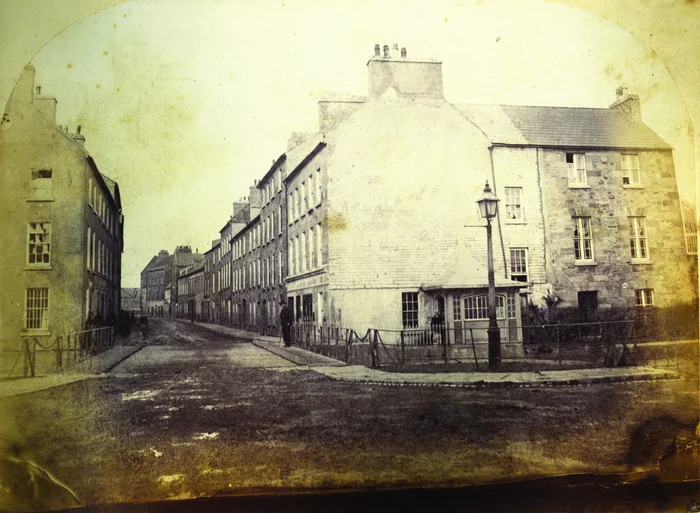 PHOTO c 1865 (GALWAY ADVERTISER) NO.31 IS ON THE LEFT OF THE PICTURE JUST OUT OF SHOT, IT IS THE SECOND BUILDING UP.