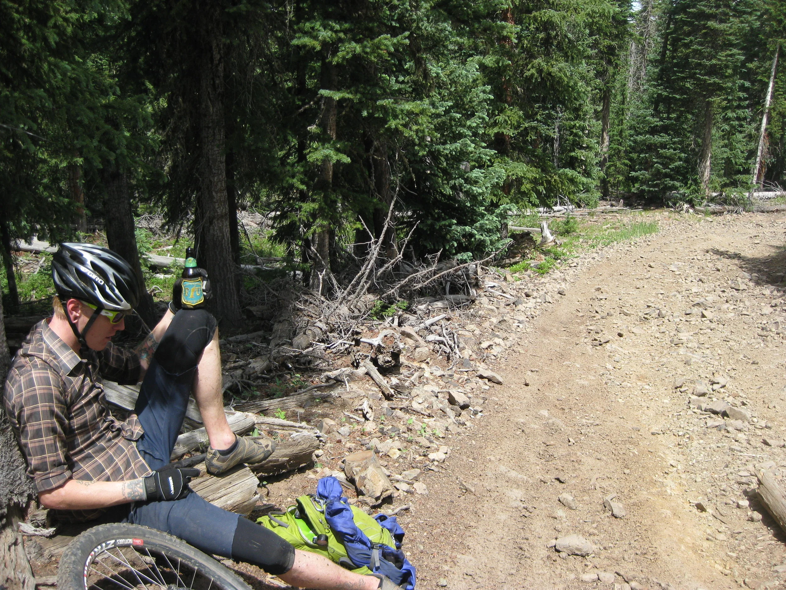 This person is drinking away the regret he feels about coming on this ride.