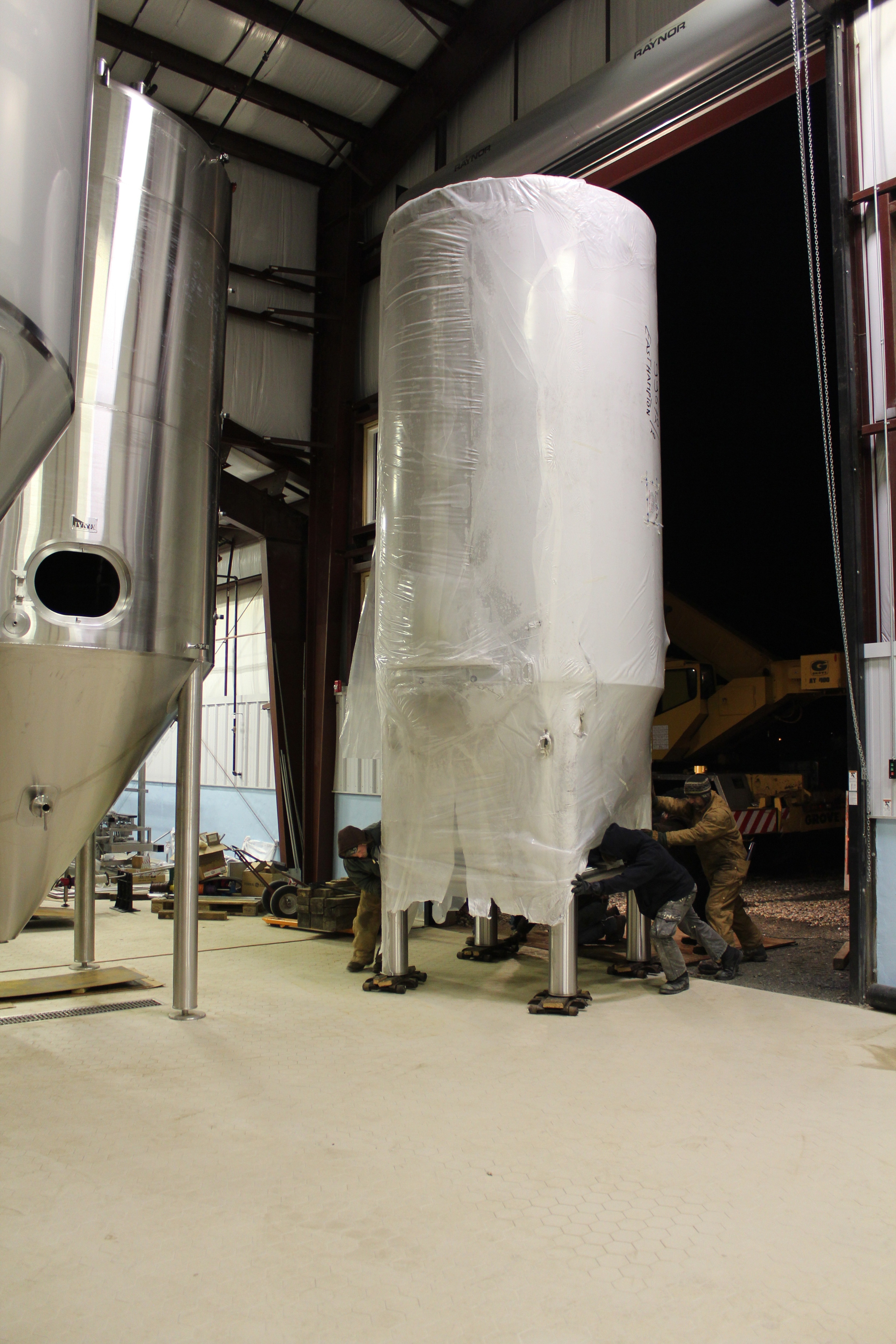 One of the shorter tanks being placed
