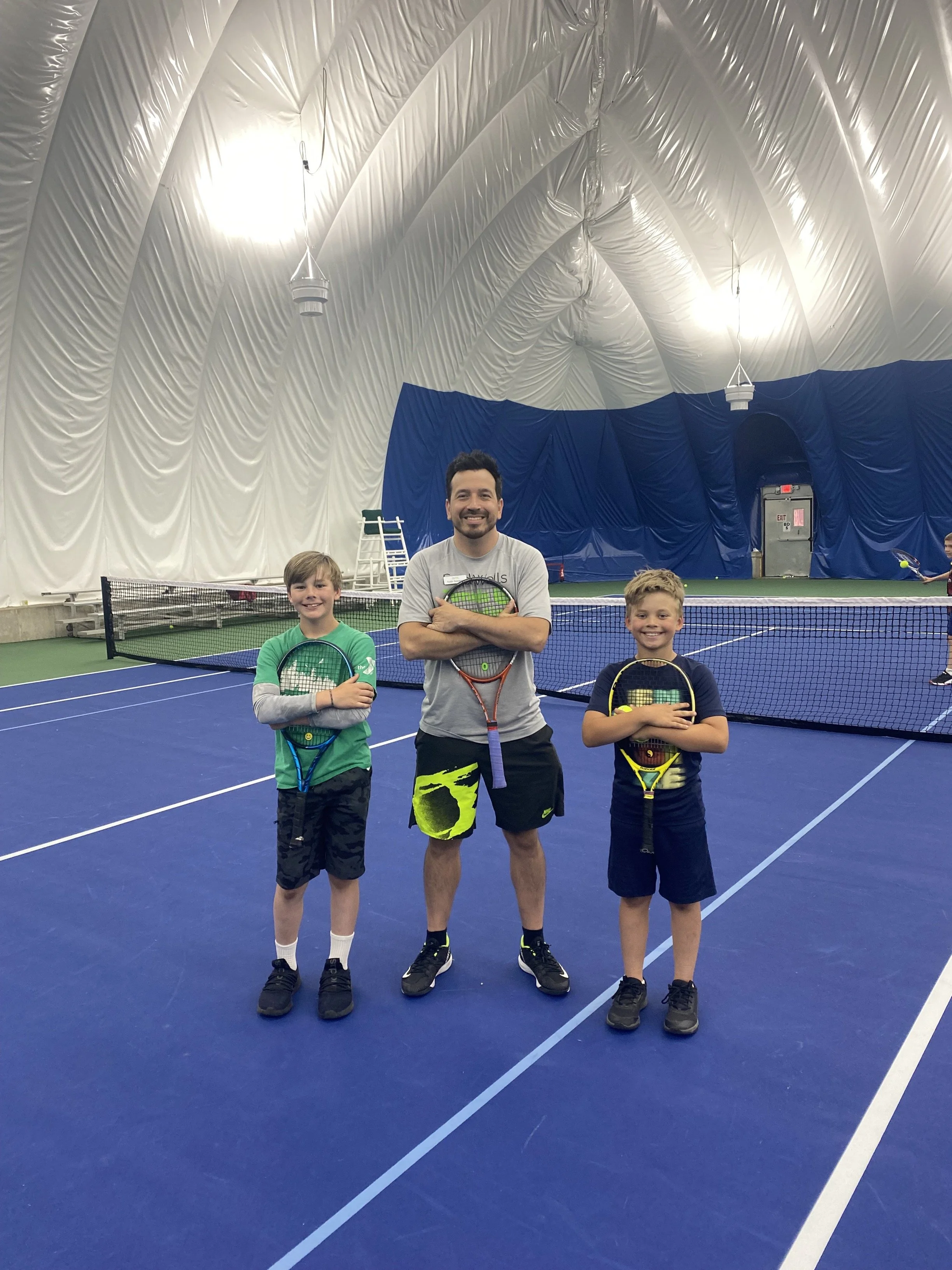 Coach Austin with Campers.png